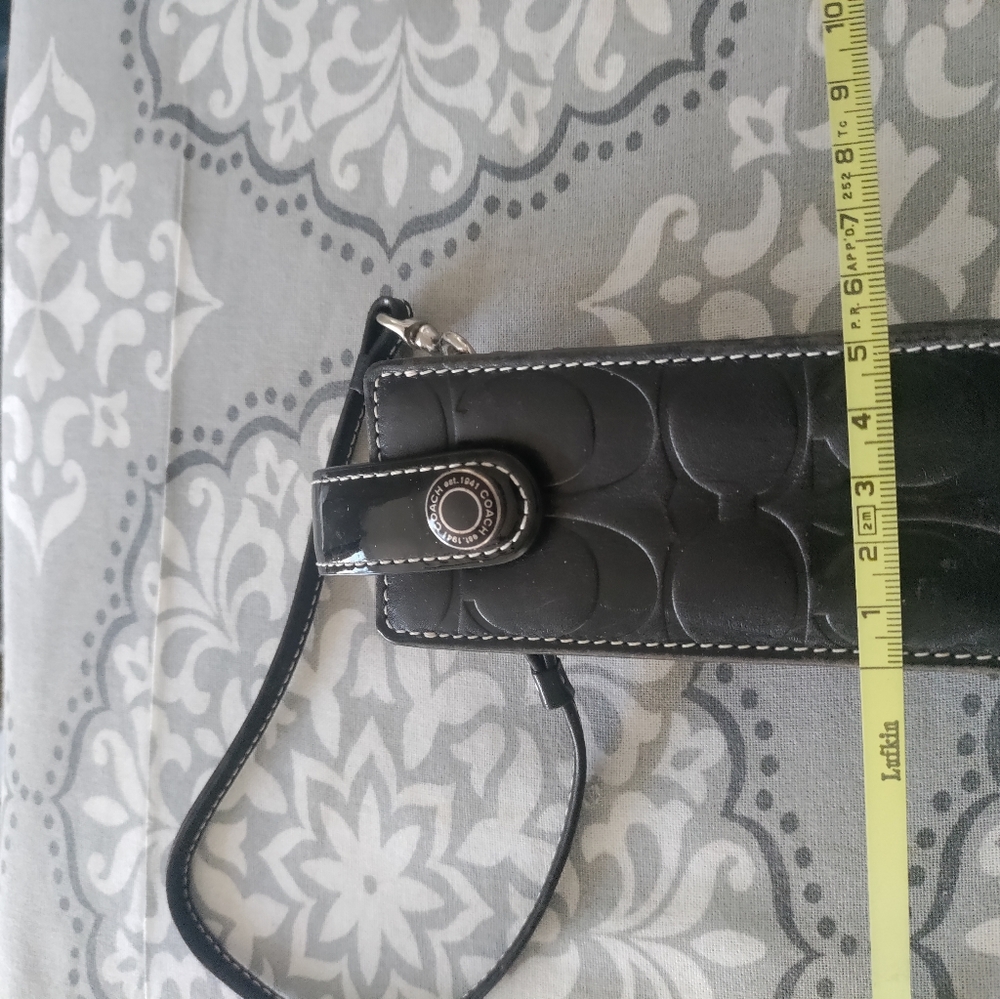 Like New Coach Leather Carry case... Black
